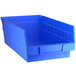 A Regency blue plastic shelf bin with a handle.