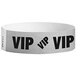 A white paper Carnival King wristband with black text reading "VIP"