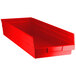 A red Regency plastic shelf bin.