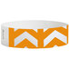 A white paper wristband with orange chevron arrows.
