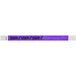 A purple Carnival King Tyvek wristband with black text reading "STAFF"