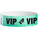 A blue paper wristband with black "VIP" lettering.
