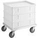 A white plastic bin on a cart with wheels.