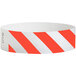 A white and red striped Carnival King Tyvek wristband.