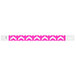 A Carnival King Tyvek wristband with a pink and white chevron pattern.