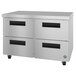 A stainless steel metal cabinet with black drawers on wheels.