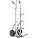 A Lavex aluminum hand truck with wheels and a "U" loop handle.
