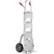A Lavex aluminum hand truck with wheels and red handles.