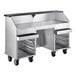 A silver stainless steel Regency portable bar with open front and two removable speed rails.