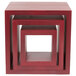 A stack of American Metalcraft mahogany wood display risers on a red surface with a white border.