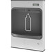 An Elkay stainless steel surface mount water bottle filling station with a bottle in the middle.