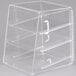 A clear plastic Cal-Mil three tier display case with shelves.