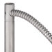 A silver metal cut off rod with a flexible tube attached.
