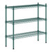 A green metal shelving unit with three shelves.