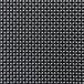 A close-up of a black and white woven fabric with white dots.
