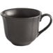 An Acopa Condesa armor gray porcelain coffee cup with a handle.