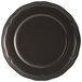 An Acopa Condesa matte gray porcelain plate with a scalloped rim.