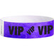 A purple paper wristband with "VIP" in black text.