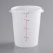 A white plastic Choice food storage container with red measurement lines.