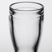 A Stolzle clear glass shot cup on a white background.
