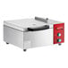 An Avantco stainless steel countertop portion steamer with a red label.