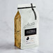A bag of Arrosto Guatemala Chiquimula Whole Bean Coffee on a white background.