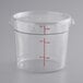 A clear Choice 6 quart round polycarbonate food storage container with measurement line.