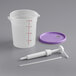A white plastic container with a purple lid and a syringe pump.