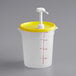 A white plastic container with a yellow lid containing a yellow Choice condiment pump.