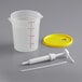 A white plastic container with a yellow lid and a white pump.