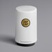 A white Franmara Zap Cap canister with a yellow logo.