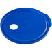 A blue plastic lid with a hole.