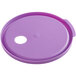 A round purple plastic lid with a hole.