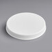 A 110/400 white plastic lid with a ribbed cap on.