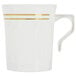 A white plastic coffee mug with gold stripes on the handle.