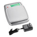 A stainless steel AvaWeigh digital portion scale with a power cord.