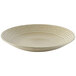 A white Dudson Harvest Norse china plate with a curved pattern.