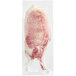 A piece of Rastelli's bone-in cowboy pork steak in a plastic bag on a white surface.