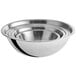 A close-up of a Choice stainless steel mixing bowl with a handle.