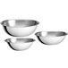 A set of three stainless steel Choice mixing bowls.