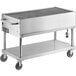 A large stainless steel Backyard Pro outdoor grill on wheels.