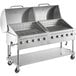 A Backyard Pro stainless steel outdoor grill on wheels.