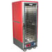 A red and silver Metro C5 holding/proofing cabinet with a clear door.