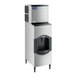 An Avantco stainless steel ice machine with a water dispenser and black and grey lid.
