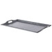 A black rectangular GET plastic room service tray with handles.