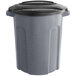 A dark gray plastic Toter trash can with a black lid.