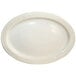 An ivory stoneware oval platter with an embossed border.