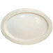 An ivory oval stoneware platter with an embossed border.