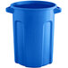 A blue Toter commercial trash can with a lid.