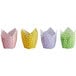 A group of tulip baking cups with polka dots in assorted colors including pink, yellow, green, and white.